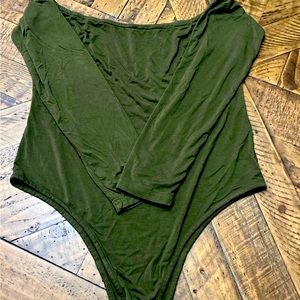 NWOT off shoulder bodysuit. Perfect condition. Smoke free home.
